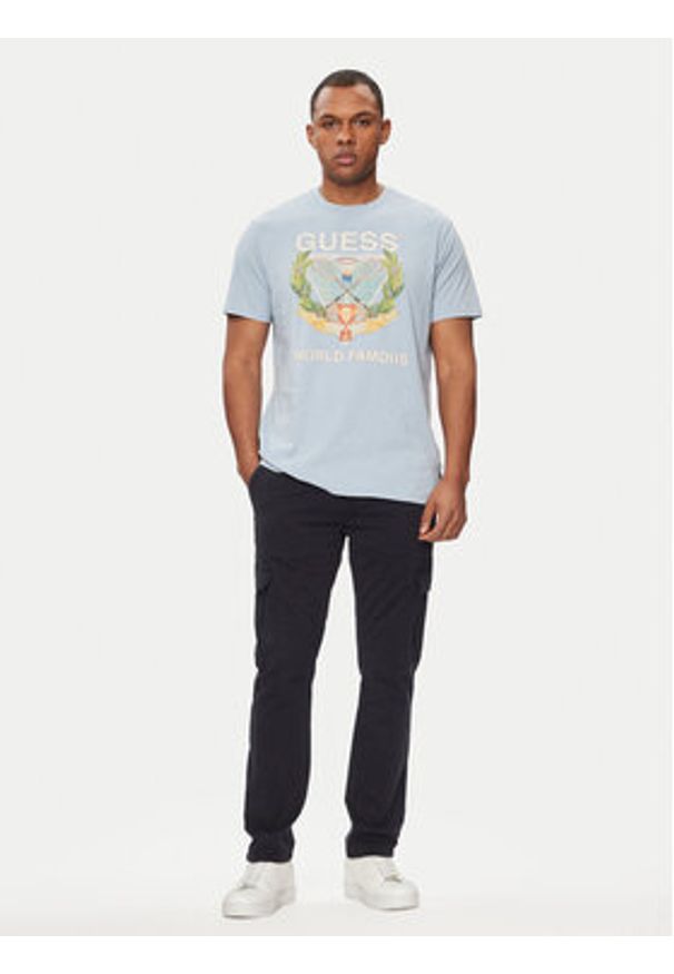 Guess T-Shirt M4GI60 K9RM1 Błękitny Regular Fit. Kolor: niebieski. Materiał: bawełna