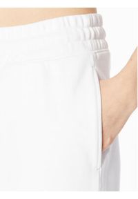Tommy Jeans Spodnie dresowe DW0DW15370 Biały Loose Fit. Kolor: biały. Materiał: bawełna