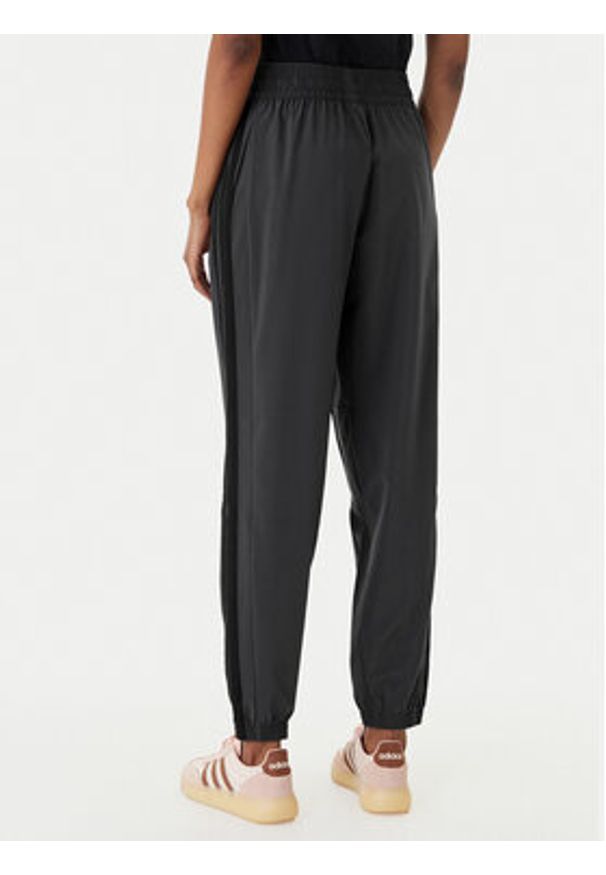 Adidas - adidas Spodnie dresowe Train Essentials 3-Stripes Woven KC5496 Czarny Regular Fit. Kolor: czarny. Materiał: syntetyk