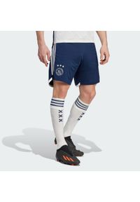 Adidas - Ajax Amsterdam 23/24 Away Shorts. Kolor: niebieski. Materiał: materiał