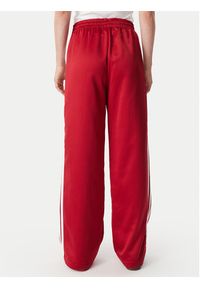 Adidas - adidas Spodnie dresowe Satin Sst Loose Trackpant KS7338 Czerwony Relaxed Fit. Kolor: czerwony. Materiał: syntetyk #3