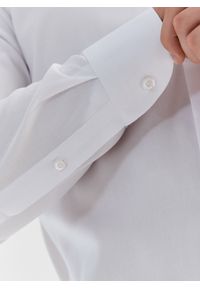 Pako Lorente - Elegancka biała koszula męska P000B-1X-577-B-S. Typ kołnierza: kołnierzyk klasyczny. Kolor: biały. Materiał: bawełna. Długość rękawa: długi rękaw. Długość: długie. Wzór: gładki. Styl: elegancki #6
