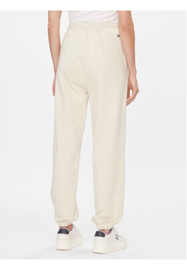 Tommy Jeans Spodnie dresowe Classics DW0DW17309 Écru Relaxed Fit. Materiał: bawełna