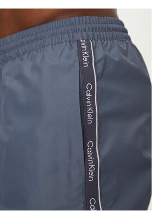 Calvin Klein Swimwear Szorty kąpielowe KM0KM01109 Niebieski Regular Fit. Kolor: niebieski. Materiał: syntetyk