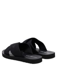 Calvin Klein Jeans Klapki Cross Sandal Crxs Tx YM0YM01223 Czarny. Kolor: czarny. Materiał: materiał