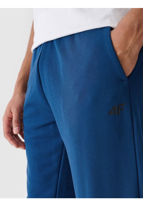 4f - 4F Spodnie dresowe joggery męskie - turkusowe M. Kolor: turkusowy. Materiał: dresówka. Wzór: gładki, ze splotem