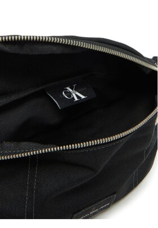 Calvin Klein Jeans Saszetka nerka Workwear Waistbag 38 LV04G3027G Czarny. Kolor: czarny. Materiał: materiał