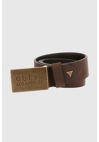 Guess - GUESS Brązowy męski pasek z naturalnej skóry Algarve. Kolor: brązowy. Materiał: skóra