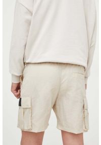 Calvin Klein Jeans szorty męskie kolor beżowy. Kolor: beżowy. Materiał: tkanina #2
