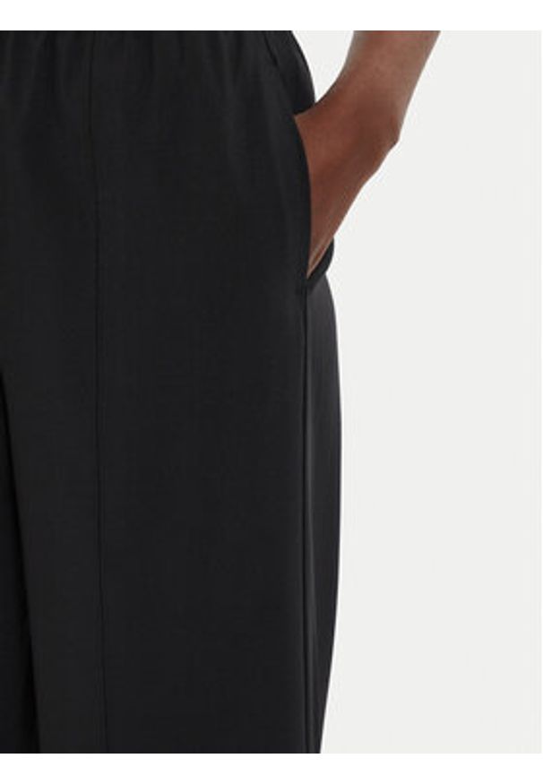 Calvin Klein Performance Spodnie dresowe 00GWF4P606 Czarny Wide Leg. Kolor: czarny. Materiał: syntetyk