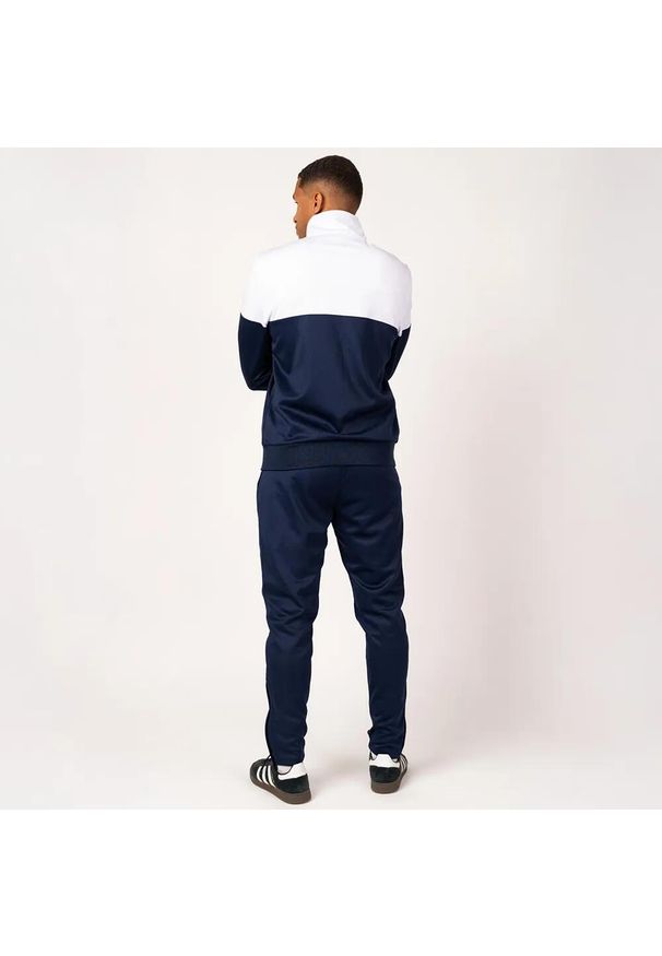 Dres piłkarski dla dorosłych Real Madrid 24/25. Kolor: wielokolorowy, niebieski, biały. Materiał: dresówka. Sport: piłka nożna