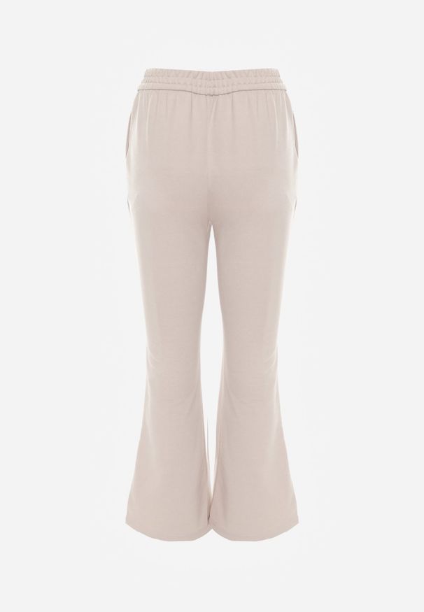 Renee - Beżowe Dresowe Spodnie Flare z Gumką w Pasie Efranaria. Okazja: na co dzień. Kolor: beżowy. Materiał: dresówka. Styl: casual