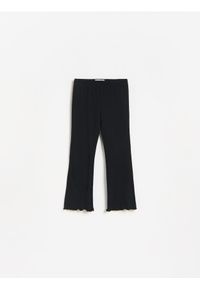Reserved - Legginsy flare - czarny. Kolor: czarny. Materiał: bawełna #1