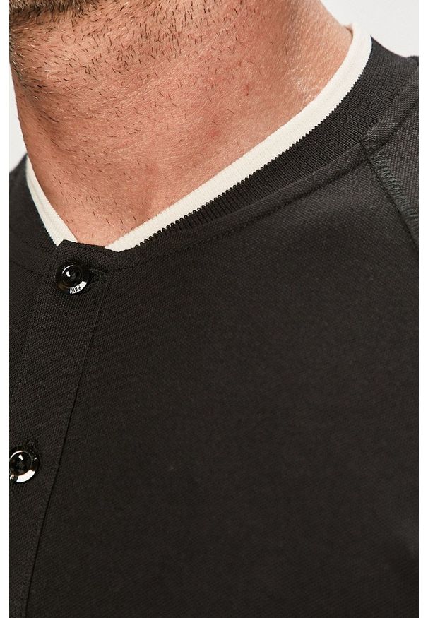 G-Star RAW - G-Star Raw - Polo. Typ kołnierza: polo. Kolor: czarny. Materiał: dzianina. Długość: krótkie. Wzór: gładki