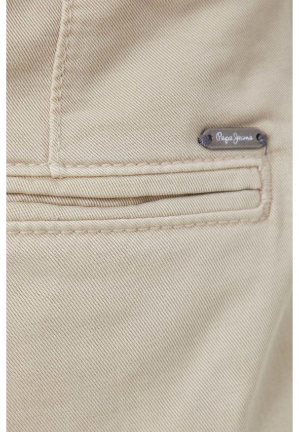 Pepe Jeans spodnie Crusade damskie kolor beżowy joggery medium waist. Kolor: beżowy. Materiał: tkanina