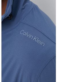Calvin Klein Performance wiatrówka Essentials kolor granatowy przejściowa. Kolor: niebieski. Materiał: skóra, materiał #5