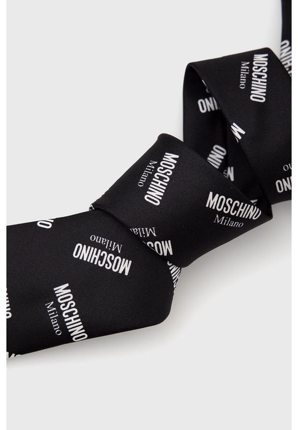 MOSCHINO - Moschino - Krawat. Kolor: czarny. Materiał: materiał