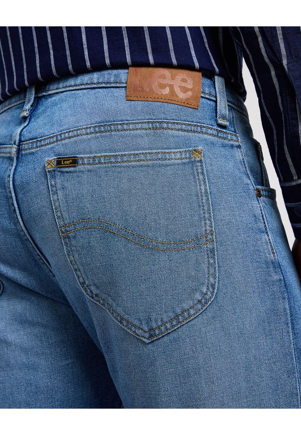 Lee - LEE RIDER MĘSKIE SPODNIE JEANSOWE JEANSY DŻINSY WORN IN TRAVIS 112349324 L701007782