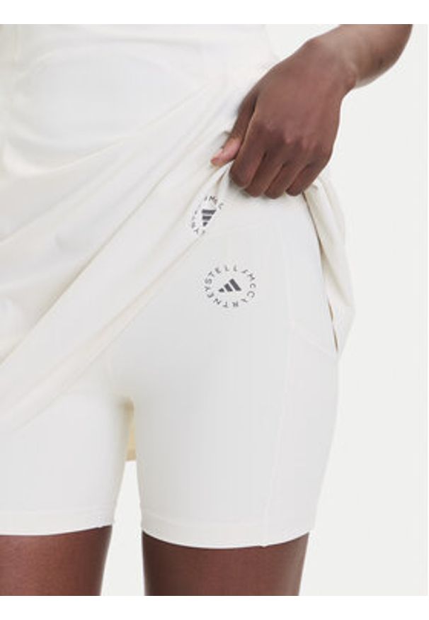 Adidas by Stella McCartney - adidas by Stella McCartney Sukienka tenisowa Training JM1409 Beżowy Slim Fit. Kolor: beżowy. Materiał: syntetyk. Sport: tenis