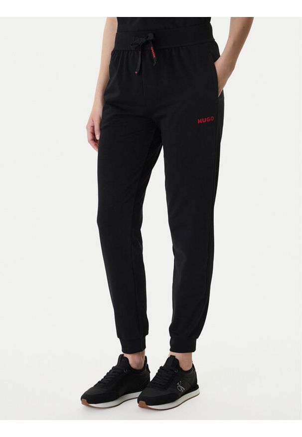 Hugo - HUGO Spodnie dresowe 50556326 Czarny Regular Fit. Kolor: czarny. Materiał: bawełna