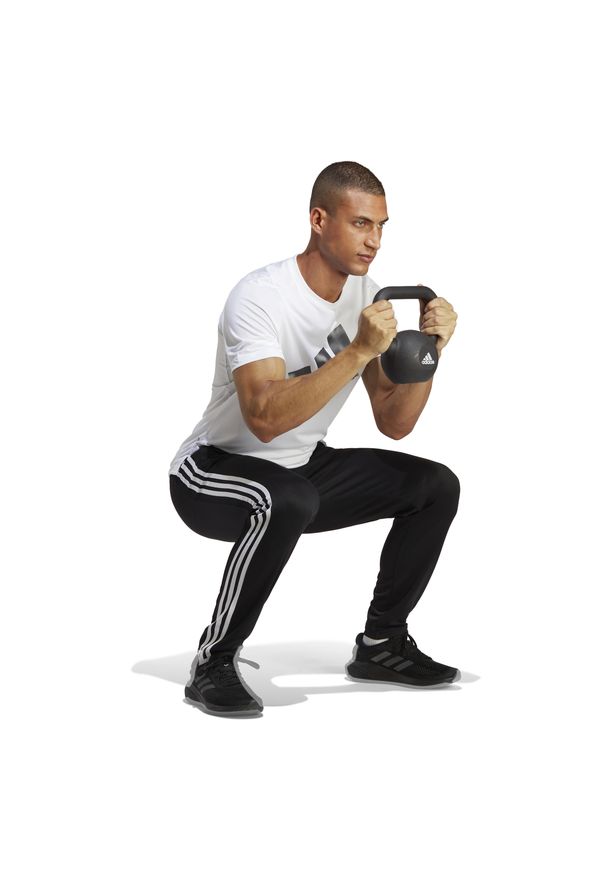 Adidas - Spodnie fitness męskie ADIDAS. Materiał: poliester, skóra, dresówka, materiał. Sport: fitness