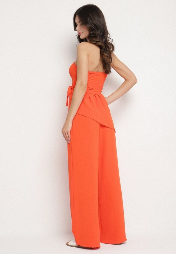 Born2be - Pomarańczowy Komplet Bluzka z Asymetrycznym Dołem i Szerokie Spodnie Ralavinea. Kolor: pomarańczowy