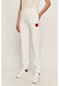 Hugo - Spodnie. Kolor: biały. Materiał: bawełna, dzianina. Wzór: gładki #1