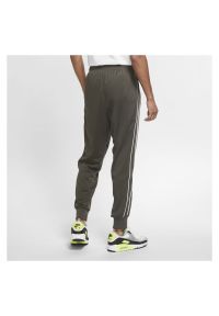 Spodnie treningowe męskie Nike Sportswear Jogger CZ7823. Kolor: brązowy. Materiał: materiał, poliester, dzianina. Wzór: napisy, ze splotem. Sport: fitness, turystyka piesza #3