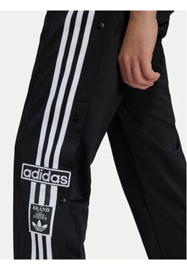 Adidas - adidas Spodnie dresowe Adibreak IY9773 Czarny Regular Fit. Kolor: czarny. Materiał: syntetyk