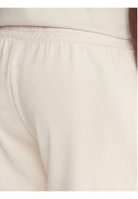 EA7 Emporio Armani Spodnie dresowe 7M000676 AF16718 U1086 Beżowy Regular Fit. Kolor: beżowy. Materiał: syntetyk #4