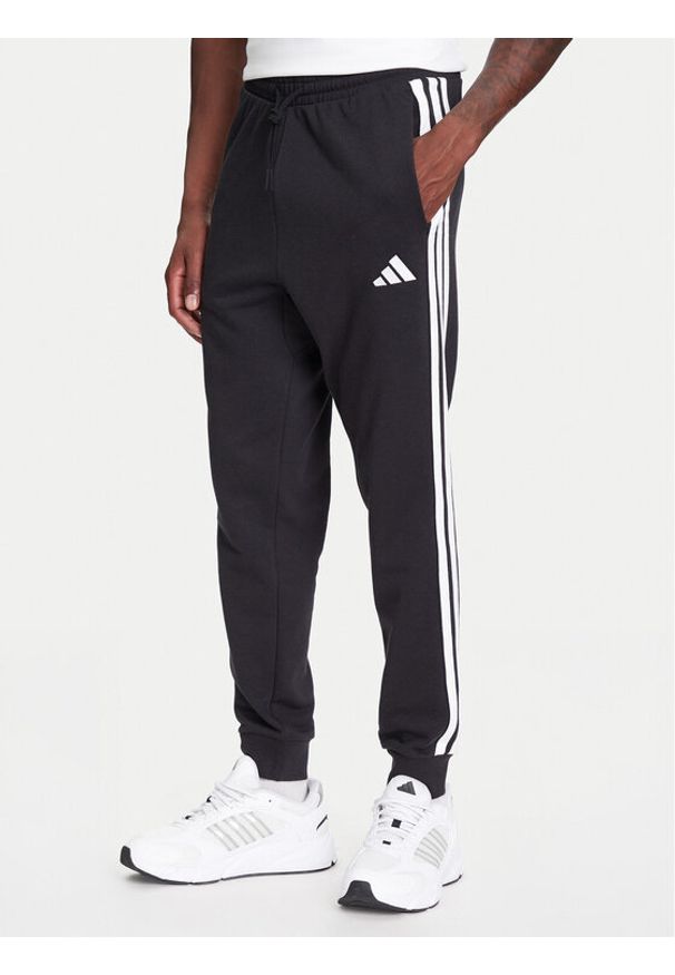 Adidas - adidas Spodnie dresowe Essential 3-Stripes JD1881 Czarny Regular Fit. Kolor: czarny. Materiał: bawełna, syntetyk