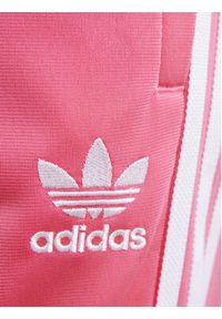 Adidas - adidas Spodnie dresowe adicolor SST IN8492 Różowy Regular Fit. Kolor: różowy. Materiał: syntetyk #4