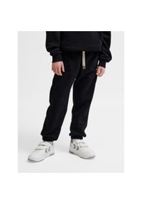 Spodnie dresowe dla dzieci Hummel Bee. Kolor: czarny. Materiał: dresówka. Sport: joga i pilates #1