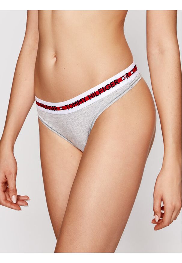 TOMMY HILFIGER - Tommy Hilfiger Stringi Thong UW0UW02458 Szary. Kolor: szary. Materiał: bawełna