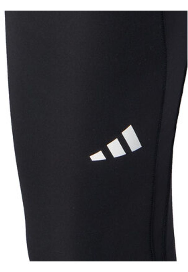 Adidas - adidas Legginsy Own the Run IS9906 Czarny Slim Fit. Kolor: czarny. Materiał: syntetyk. Sport: bieganie