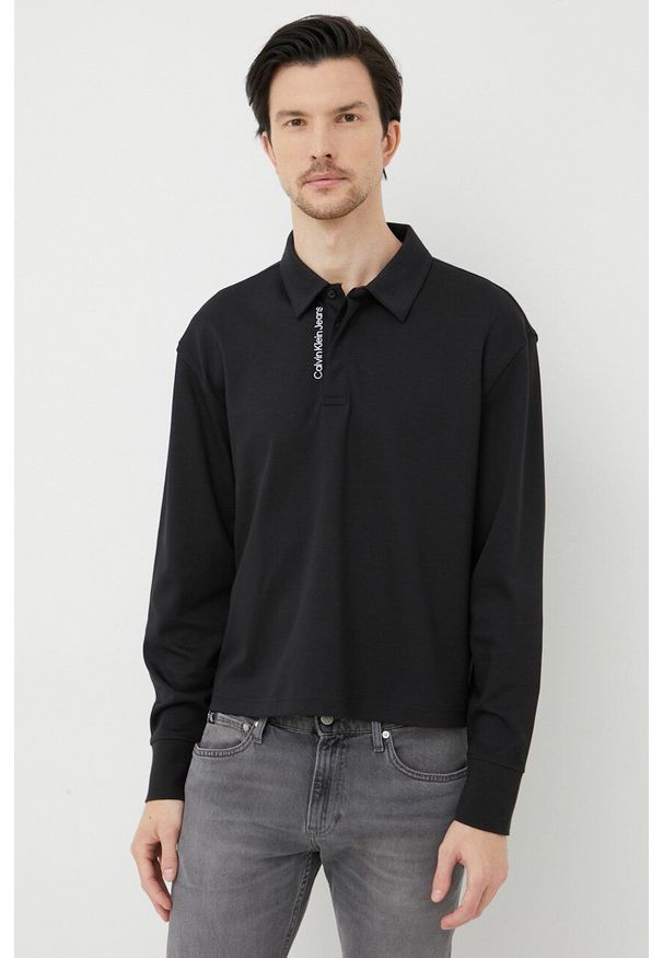Calvin Klein Jeans longsleeve bawełniany kolor czarny gładki. Kolor: czarny. Materiał: bawełna. Długość rękawa: długi rękaw. Długość: krótkie. Wzór: gładki