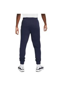 Spodnie treningowe męskie Nike FLC Park20. Kolor: niebieski, wielokolorowy, biały. Materiał: dresówka, bawełna. Sport: fitness