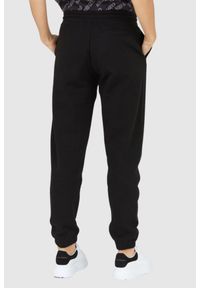 Kenzo - KENZO Czarne spodnie dresowe damskie z kwiatkiem, Rozmiar XS. Kolor: czarny. Materiał: dresówka. Wzór: kwiaty. Sport: bieganie #4