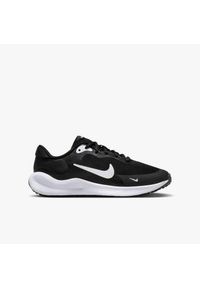 Buty do biegania dla dzieci Nike Revolution 7. Zapięcie: sznurówki. Kolor: biały, wielokolorowy, czarny. Materiał: materiał, syntetyk, tkanina. Szerokość cholewki: normalna. Model: Nike Revolution