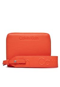 Calvin Klein Duży Portfel Damski Gracie Wallet W/Strap Md K60K611387 Pomarańczowy. Kolor: pomarańczowy. Materiał: skóra #1