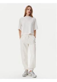 Tommy Jeans Spodnie dresowe Script DW0DW20670 Écru Relaxed Fit. Materiał: bawełna #2