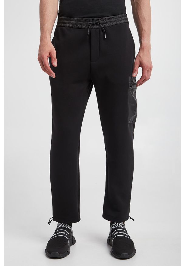 Emporio Armani - Spodnie dresowe męskie EMPORIO ARMANI. Materiał: dresówka