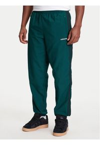 Adidas - adidas Spodnie dresowe Brushed JX3079 Zielony Regular Fit. Kolor: zielony. Materiał: syntetyk