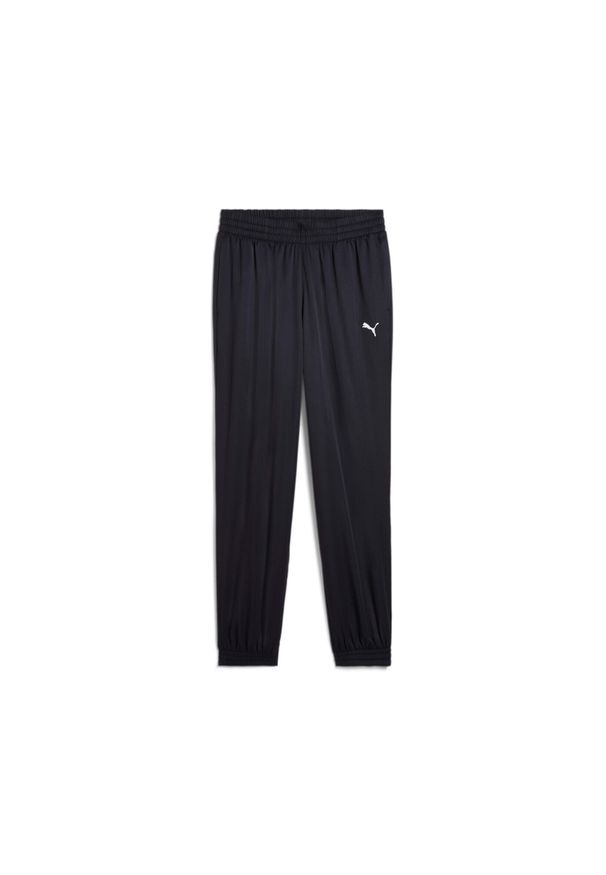 Spodnie do biegania Puma Woven. Kolor: niebieski. Materiał: dresówka