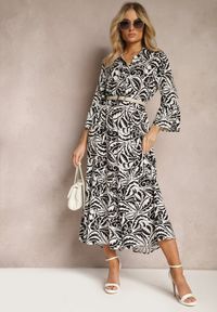 Renee - Czarno-Biała Sukienka Maxi z Falbanką z Guzikami i Liściastym Wzorem Polka. Kolor: czarny. Długość rękawa: długi rękaw. Styl: elegancki. Długość: maxi #3