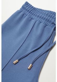mango - Mango Spodnie Amelie damskie joggery medium waist. Kolor: niebieski. Materiał: tkanina, włókno #4