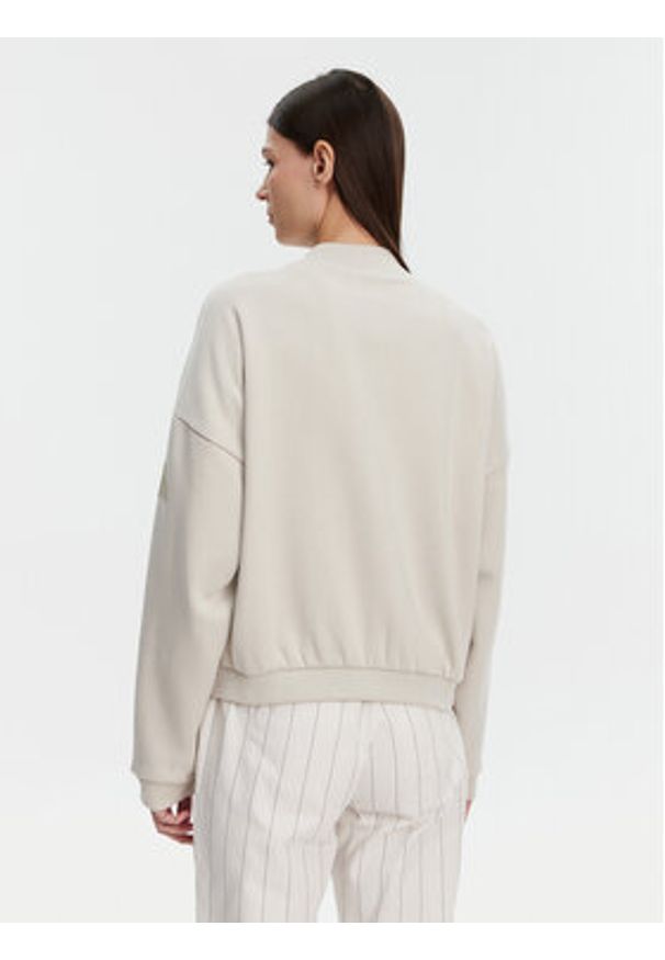 Adidas - adidas Bluza Essentials Contemporary Logo JD9972 Beżowy Loose Fit. Kolor: beżowy. Materiał: bawełna