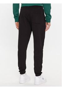 Tommy Jeans Spodnie dresowe Entry Graphic DM0DM18357 Czarny Slim Fit. Kolor: czarny. Materiał: bawełna