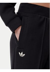 Adidas - adidas Spodnie dresowe adicolor Neuclassics JI8516 Czarny Loose Fit. Kolor: czarny. Materiał: bawełna #6