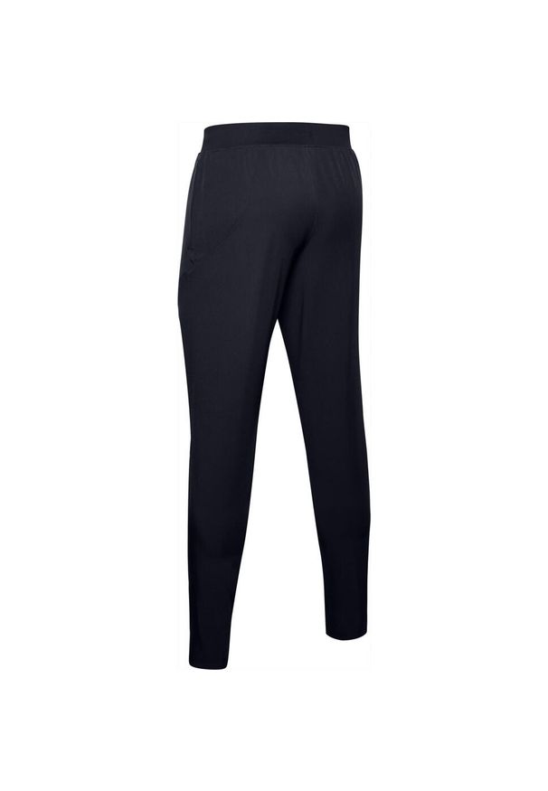 Spodnie dresowe slim fit Under Armour Flex Woven. Kolor: czarny, szary, wielokolorowy. Materiał: dresówka. Sport: fitness